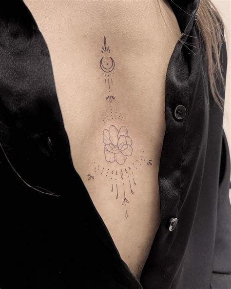 lower boob tattoo|24 Elegant Under Breast Tattoo Ideas for Women